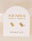 gold earrings in the shape of the aquarius zodiac sign