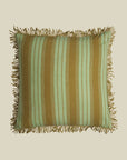 A green striped pillow with fringe detailing around the edges.