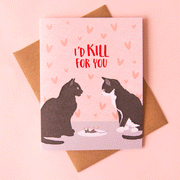 On a pink background is a pink card with an illustration of two black cats looking at each other with a plate in between that has a dead mouse on it. There is text above the illustration that reads, "I'd Kill For You" in red letters. 
