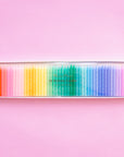 A pack of 50 twisted candles in all the colors of the rainbow