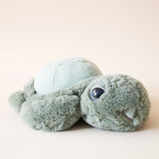 The sweetest stuffed turtle complete with the softest sea salt green fabric, happy round eyes and a cutesy smile.