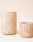 Cane wrapped votives in two different sizes.