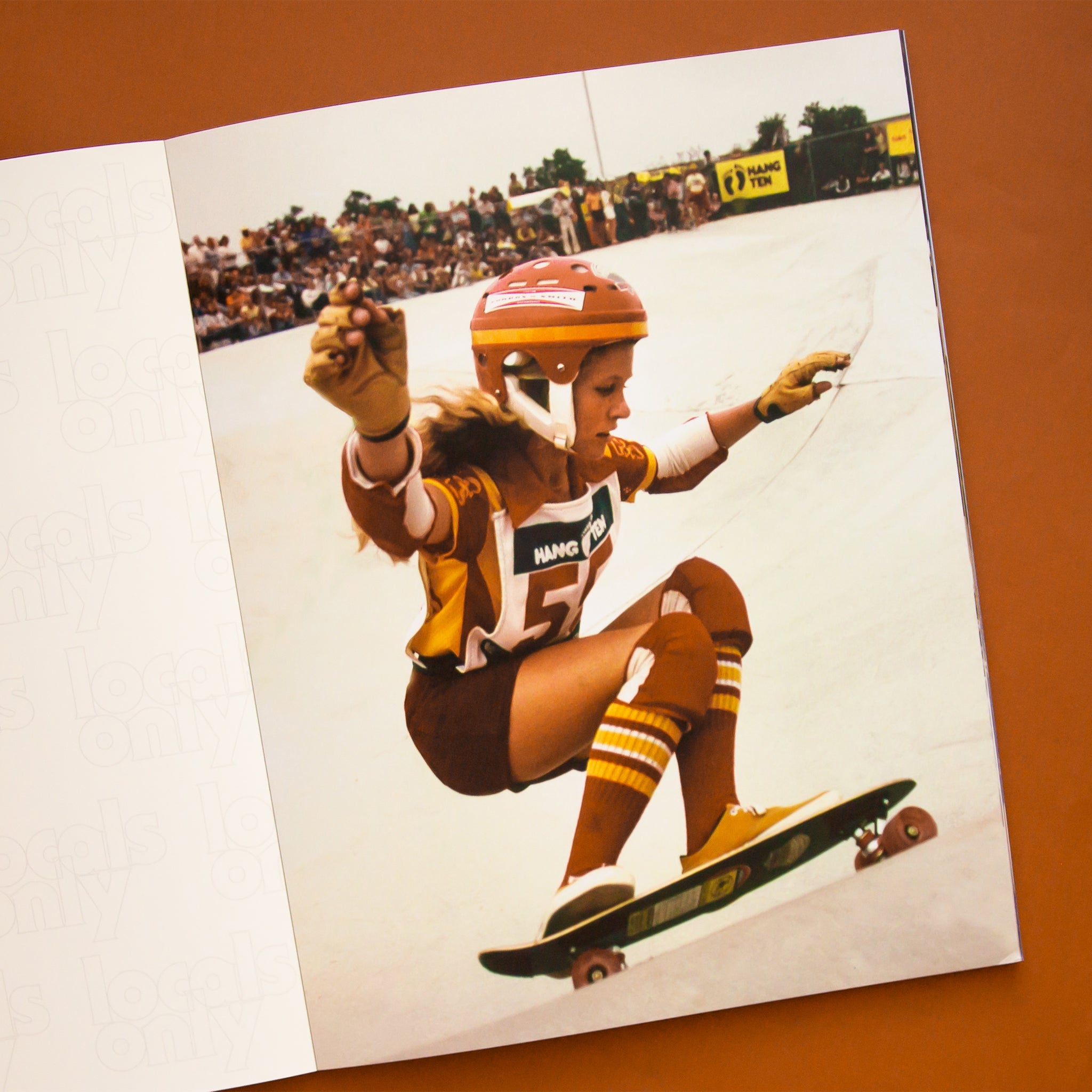 A photo of the inside of the book. This page features a photo of someone skateboarding. 