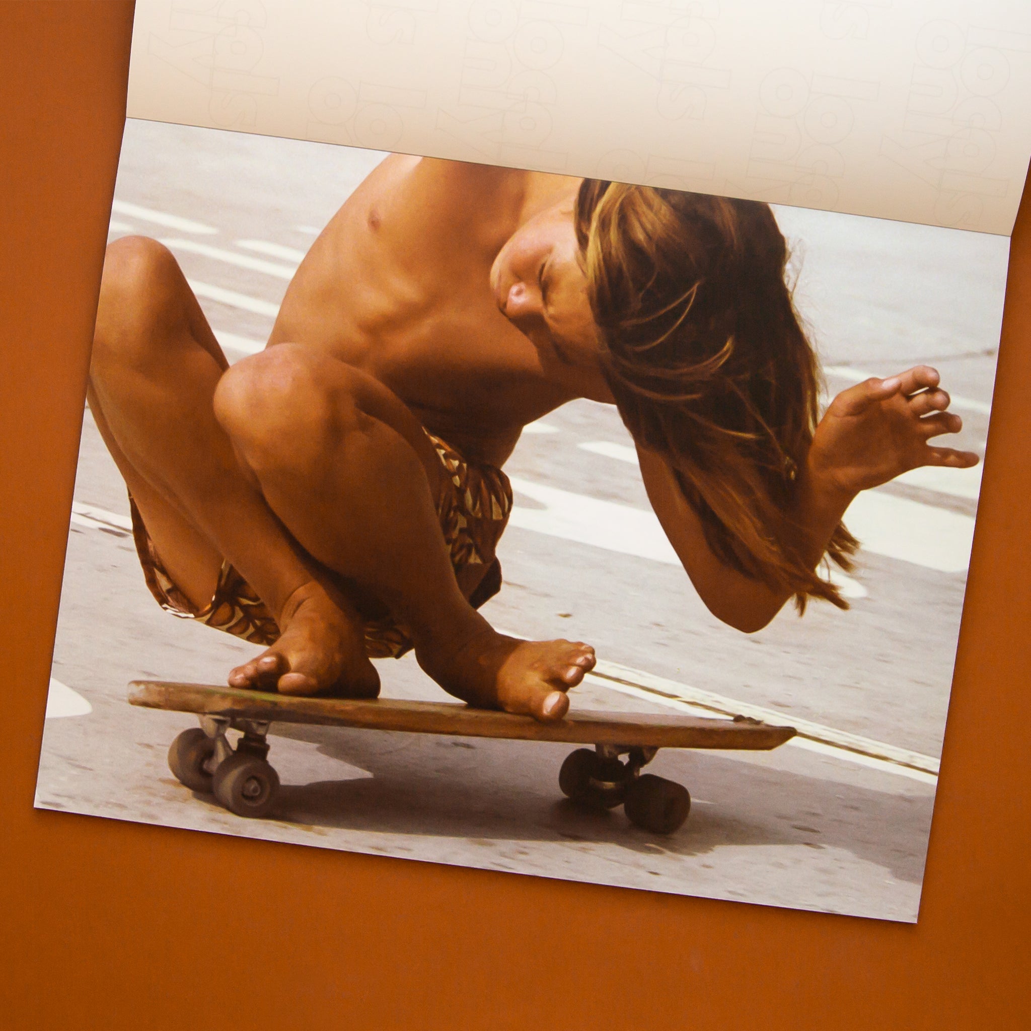 A photo of the inside of the book. This page features a photo of someone skateboarding.