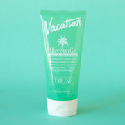 A green bottle of after sun aloe gel with white text and an ivory squeeze tube top.