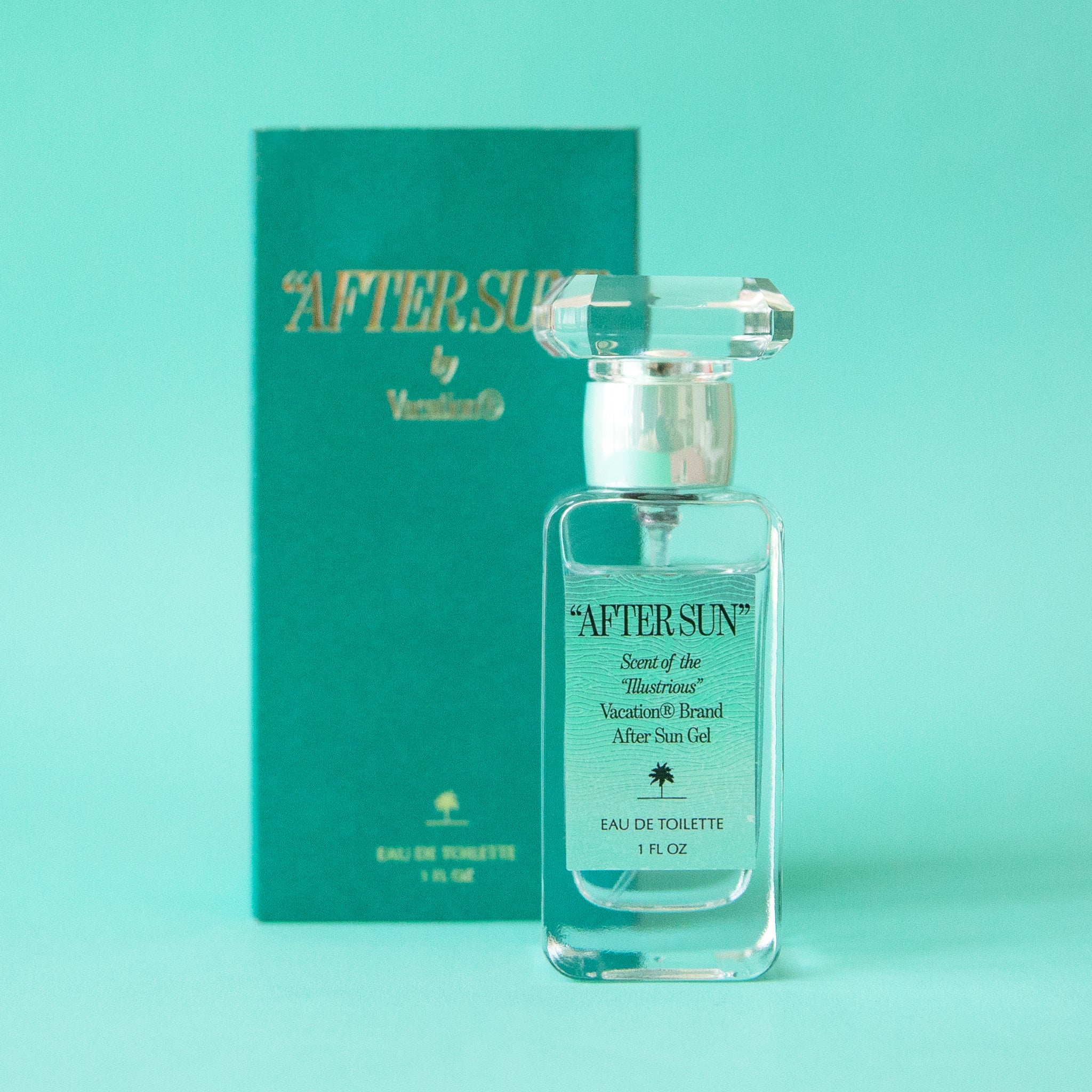 A box of perfume and a clear bottle with a teal blue label on the front that reads, &quot;After Sun Scent of the Illustrious&quot;.
