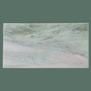 A cream marble cutting board.