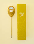 A chartreuse moisture meter with a rounded head and a white meter that ranges from dry, moist, or wet along with a small oval label in the front that reads, "Jungle Club".