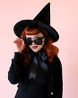 A black velvet witch hat.