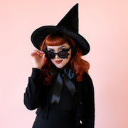 A black velvet witch hat.
