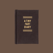 A small brown diary with gold foiled text that reads, 'A Tiny Fart Diary'.