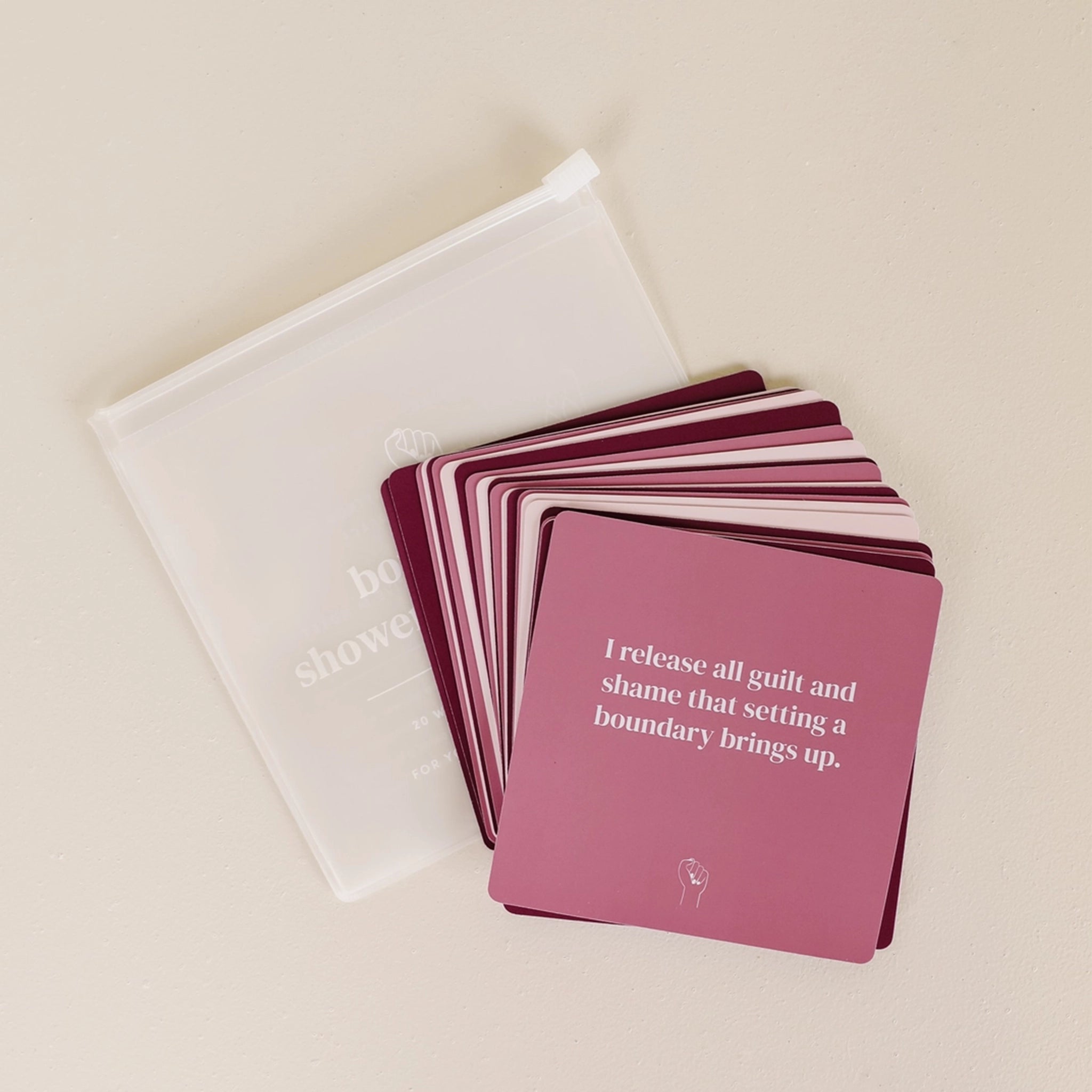 Different shades of purple cards with affirmations on the theme of boundaries that stick to your shower wall when wet.