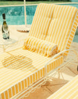 A white and yellow cushion lounge chair cushion sold separately from the chair base.