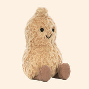 A neutral peanut shaped stuffed animal.