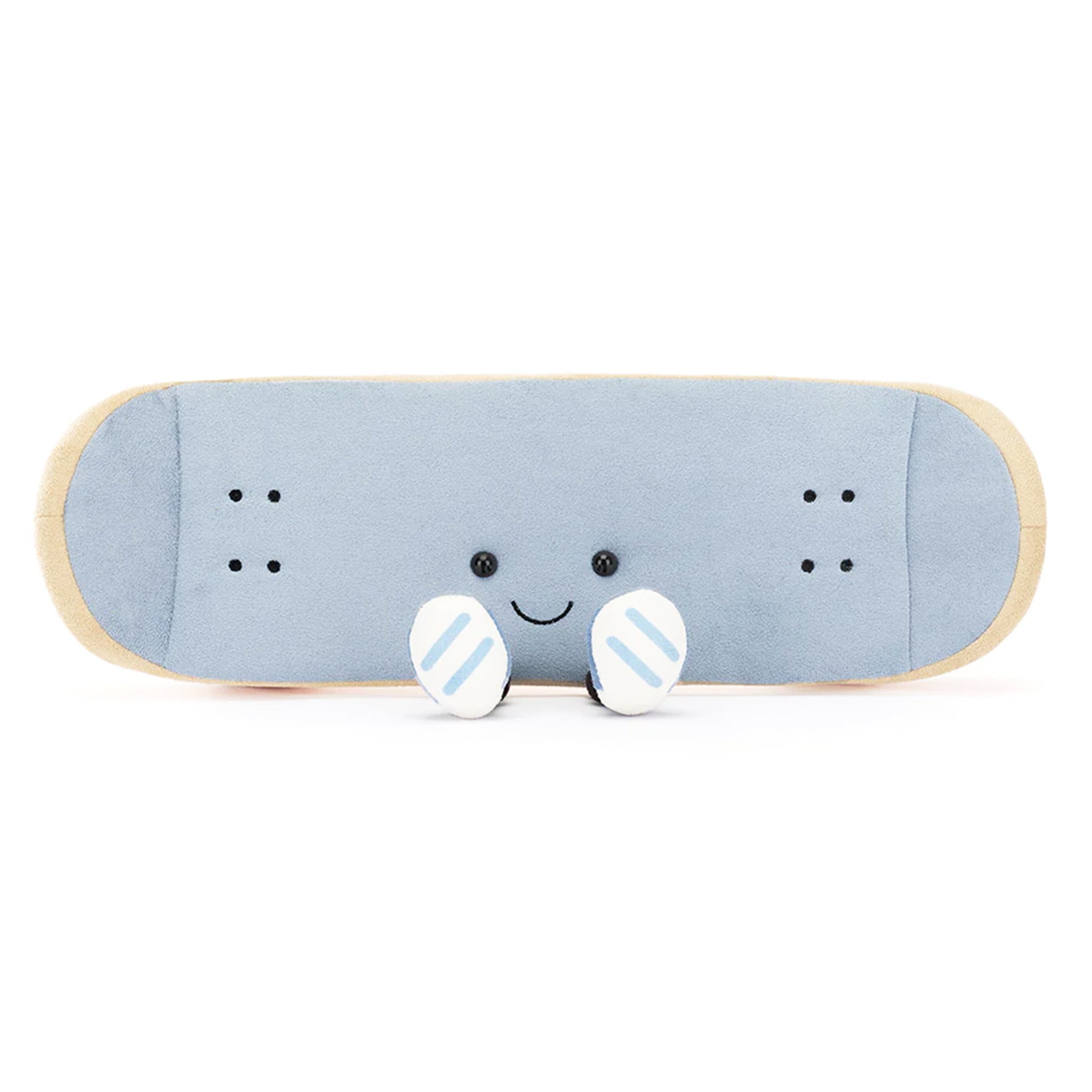 A skateboard shaped stuffed toy with small legs and feet and a smiling face. 