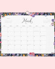 Each monthly view inside of the calendar with a different floral border around each month.