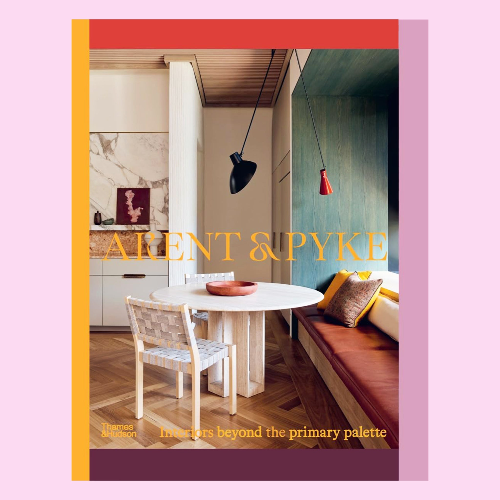 On a purple background is a book cover with a multi colored border and a photo of a curated dining room and the title in yellow that reads, &quot;Arent &amp; Pyke&quot;. 