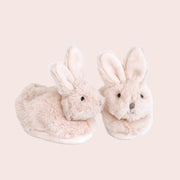 A pair of bunny shaped slippers for kids.