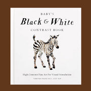 A white children's book with a graphic of a black and white zebra and text that reads, 'Baby's Black & White Contrast Book'.