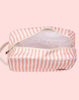 A coral and ivory striped cosmetic bag.