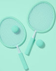 A pair of aqua rackets with two balls.