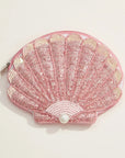 A pink beaded shell shaped pouch.
