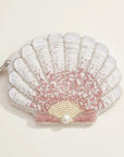 A white and pink beaded shell shaped pouch.