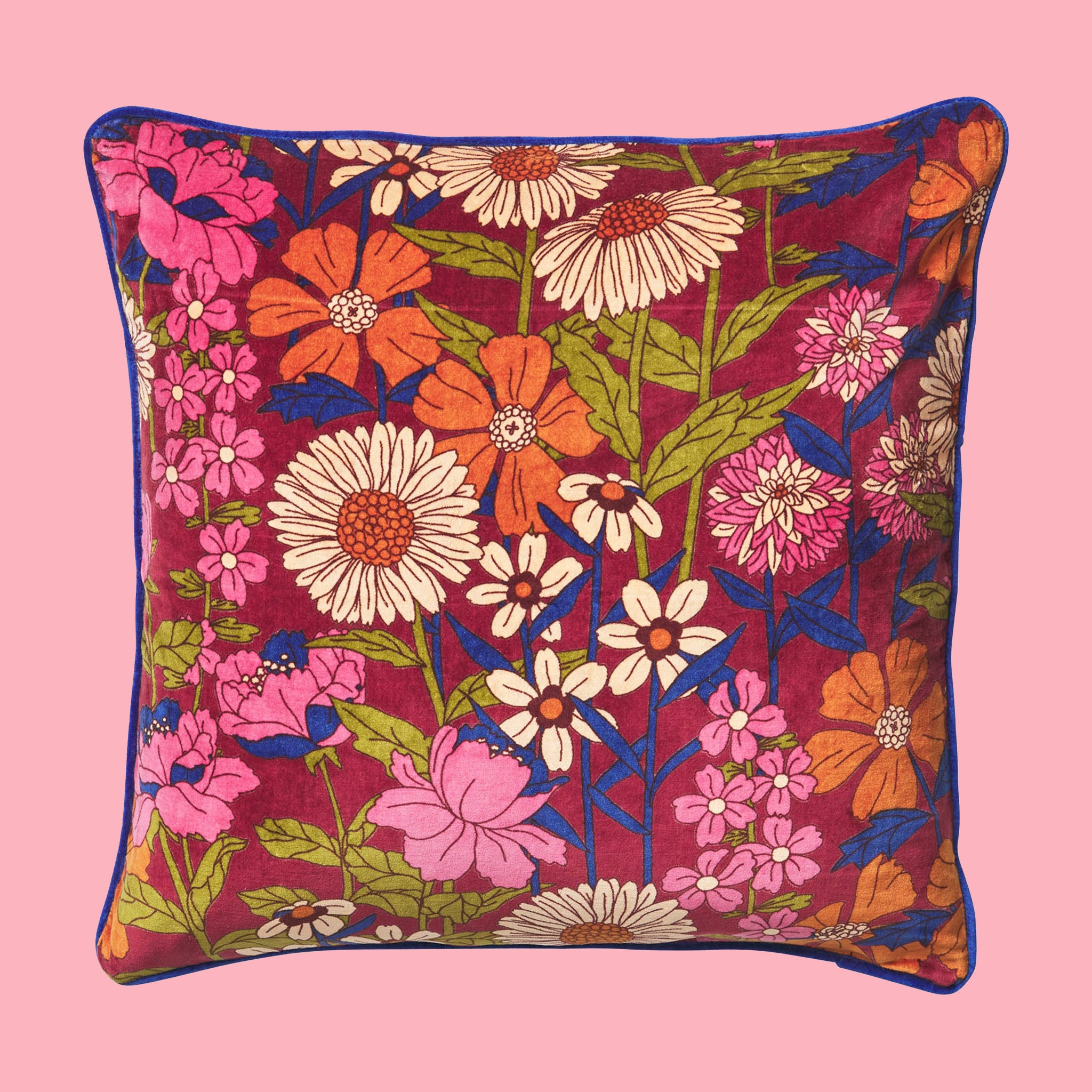 A multicolored floral print pillow. 