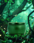 A green tin candle with gold details that reads, 'Voluspa, Bewitching Banyan Forest' Wicked.