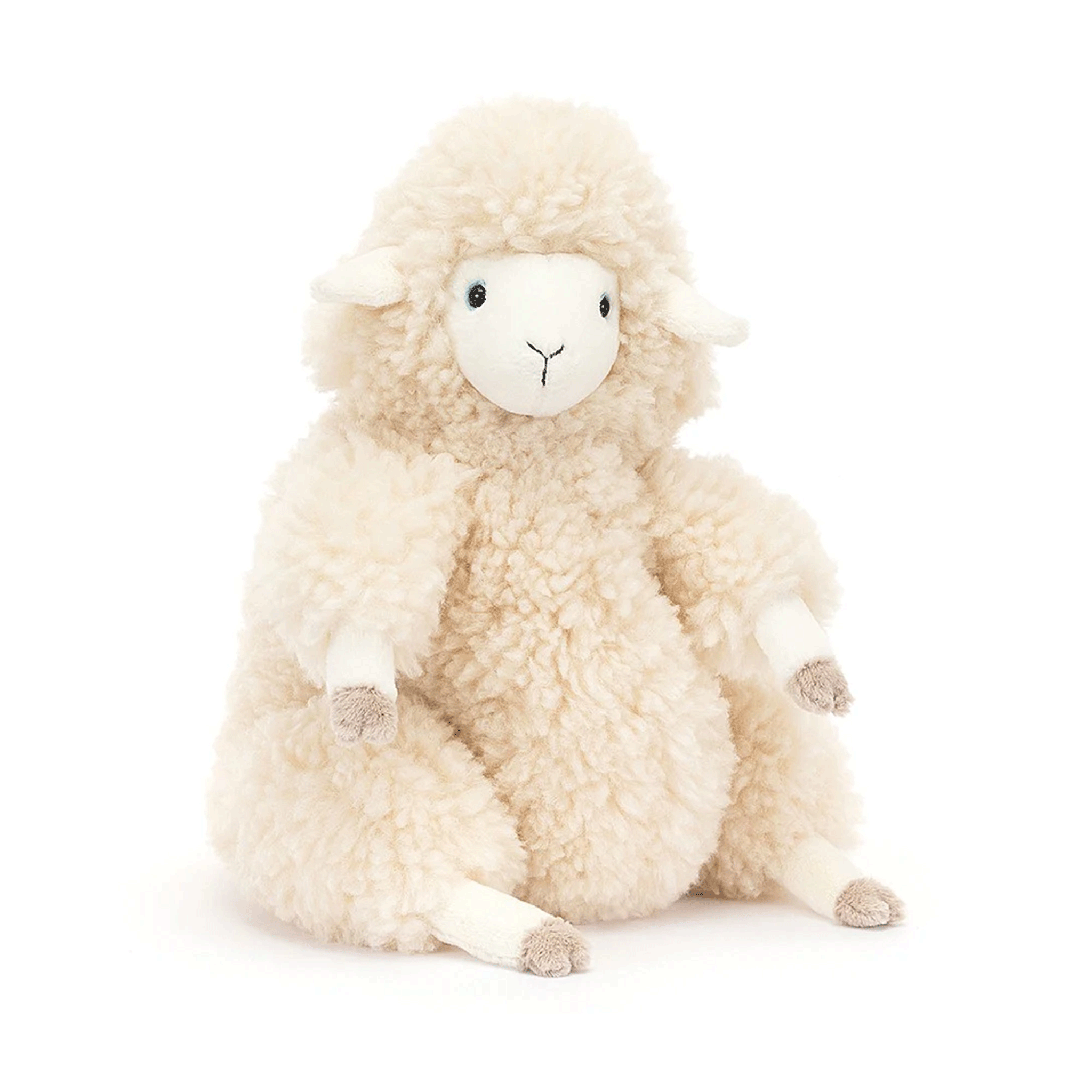 On a white background is an ivory fluffy sheep stuffed animal toy. 