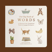 An ivory square book with neutral items on the front cover with text in the center that reads, 'Our Big Book of Words'.
