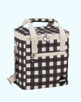 A black and white mini cooler bag with zipper closures and straps.