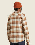 A tan, cream and brown plaid flannel shirt for men.