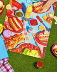 A puzzle with an image of a hot dug and burger spread.
