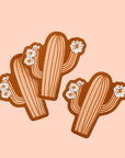 Three salmon pink cactus stickers with cactus flowers on each arm.