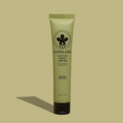 A green hand cream bottle with black text and details that read, 'Nopalera Cactus Hand Cream'.