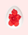 Gummy red, apple shaped candies.