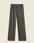 A pair of washed black lounge pants with a drawstring.