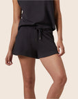 A pair of black lounge shorts with a tie detail.