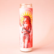 A thin unscented candle in a glass jar with a label that features a hot pink image of the pop icon Chappell Roan.