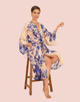 A tan and blue kimono robe with a blue floral print.