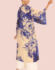 A tan and blue kimono robe with a blue floral print.