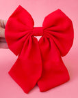 A red oversized bow for hair.