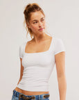 A white short sleeve t-shirt with square neckline.