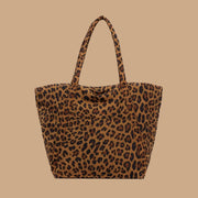 A leopard print puffer tote bag.