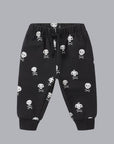 Kids black sweatpants with a white skull and crossbones print. The sweatpants have a drawstring waistband.
