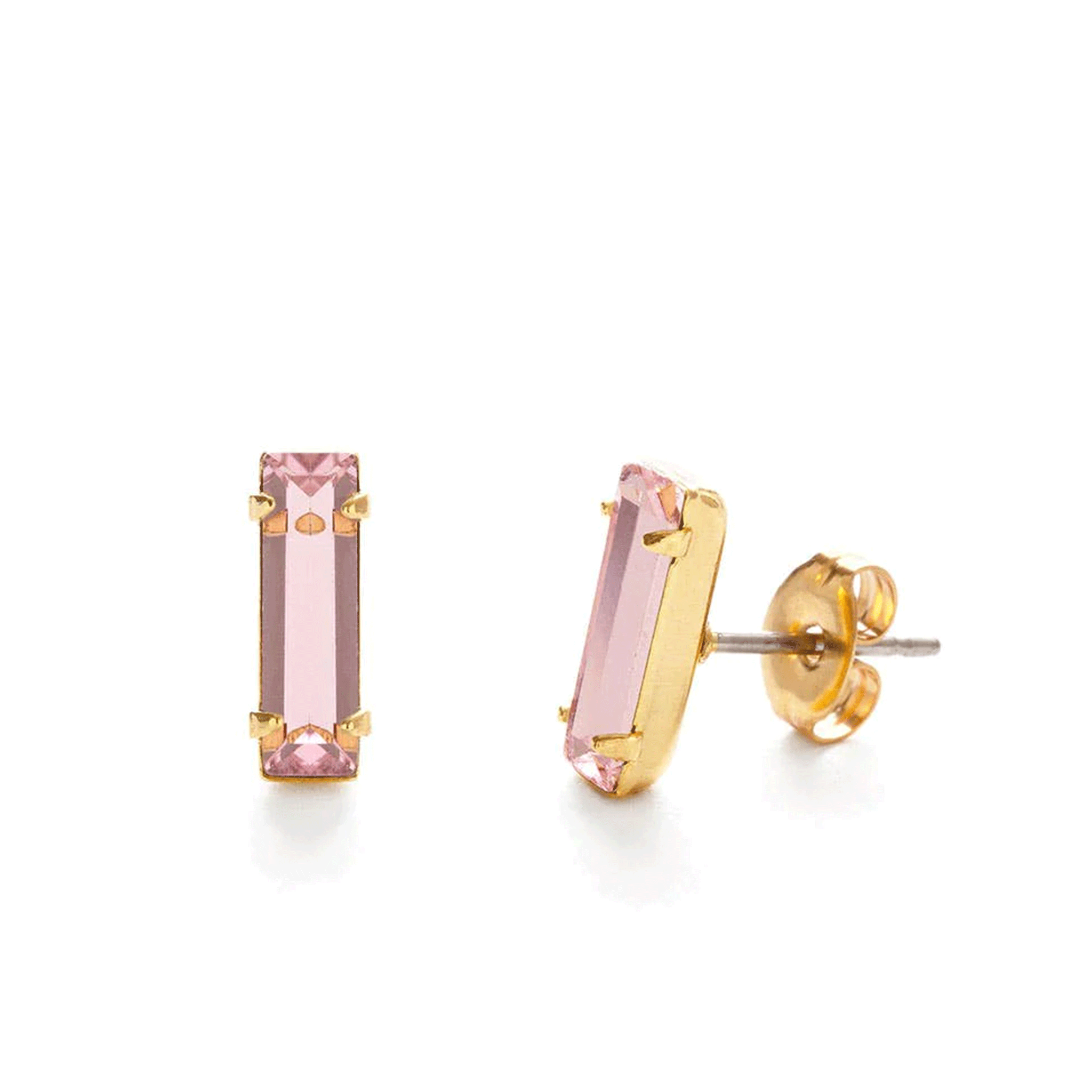 On a white background is a gold plated of pair of baguette stud earrings with a pink stone in the center. 