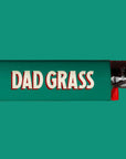 A green lighter with "Dad Grass" on one side and "Lighten Up" on the other.