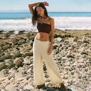 a pair of neutral flowy pants.