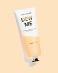 A white and light tannish orange tube of hand cream that reads, "Dew Me Intensely Moisturizing Hand Cream".